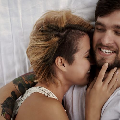 couple-tattoos-bed-happy-love