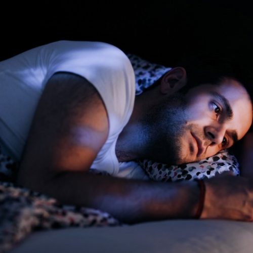 watch-porn-because-cant-get-relationship-single-sad-lonely-boy-guy-dude-man-bed-iphone-phone