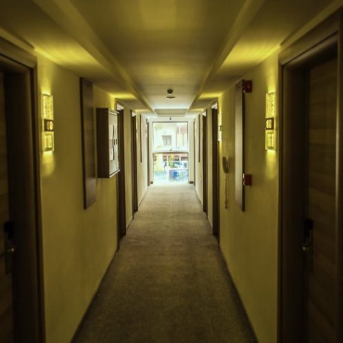 hotel-complicit-sex-trafficking-exploitation-doors-hallway